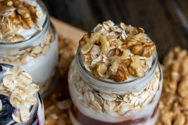 istock Fresh delicious yogurt made from milk with walnuts 1464435600