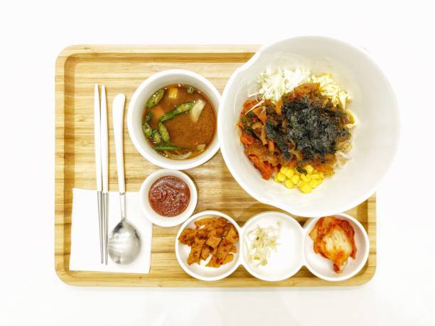 Kimchi fried rice, miso soup and sauces top view.  Traditional Korean food.