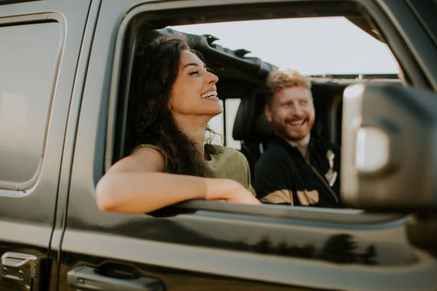 istock Couple having fun on roadtrip 1464442940