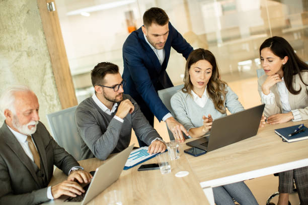 istock Businesspeople working in team in the office 1464444079