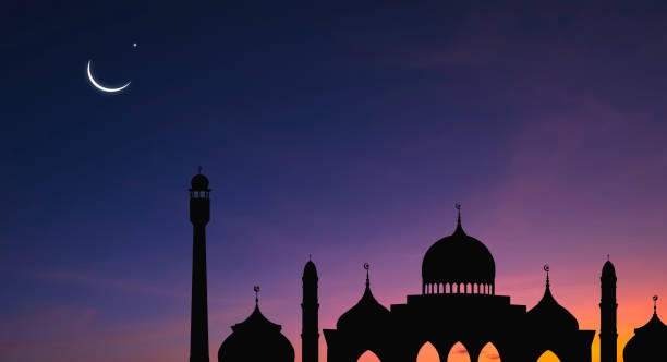 istock Silhouette Mosques Dome and Crescent Moon on dark blue Twilight sky background during Ramadan holy month 1464444269