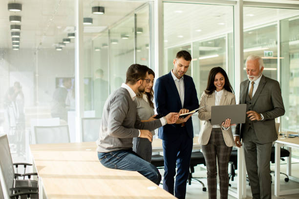 istock Businesspeople working in team in the office 1464444280