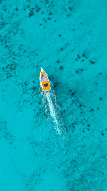 istock Blue ocean Orange Boat 1464444434