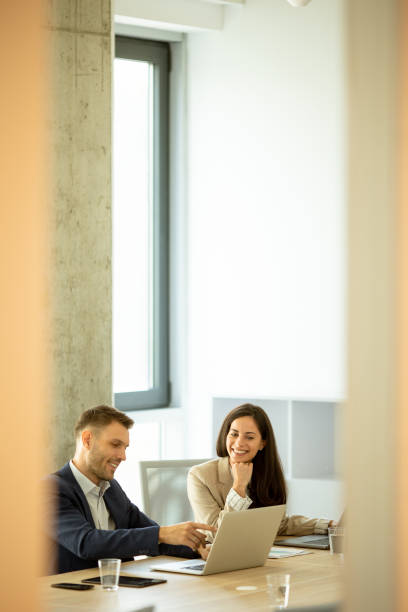 istock Businesspeople working as a team in the office 1464444725