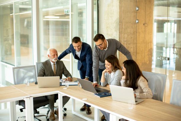 istock Businesspeople working in team in the office 1464444747