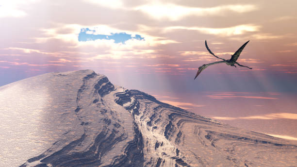 istock Pterosaur Quetzalcoatlus flying over a mountainous landscape 1464449627