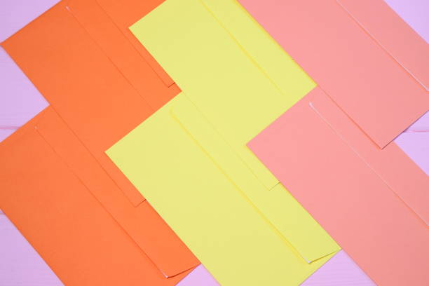 istock Group of colorful envelopes on wooden table, mock up 1464459897