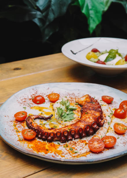 istock Octopus tentacle gourmet serving in a French restaurant 1464461747
