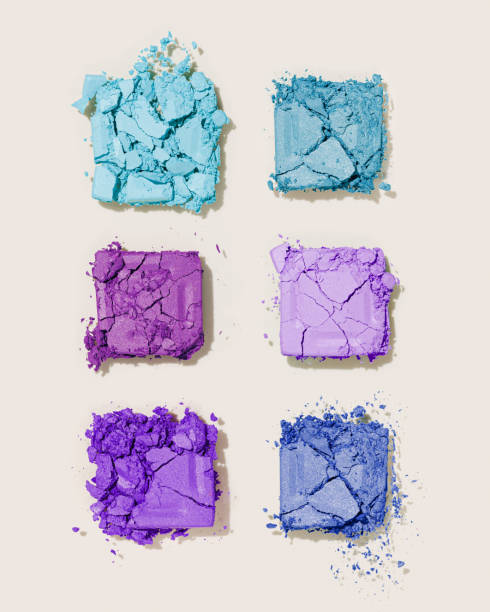 istock Beauty product eyeshadows for makeup as minimal pattern on beige background, flat lay blue teal violet colors swatch eyeshadows, cosmetic textures, color pallete, top view still life 1464462362
