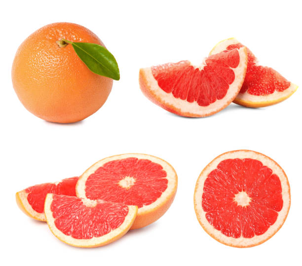 istock Set with whole and cut ripe juicy grapefruits on white background 1464462506