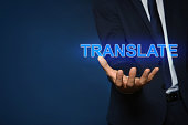mann-zeigt-virtuelles-modell-des-wortes-translate-vor-dunkelblauem-hintergrund-nahaufnahme.jpg?b=1&s=170x170&k=20&c=PxH2sIMlgPZe9O-lg1PdJvSbTbVSxiu_vR2c4imfdXs=