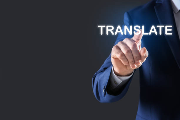 istock Man pointing at virtual model of word TRANSLATE against grey background, closeup. Space for text 1464462661