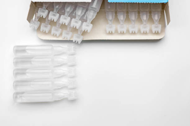 istock Single dose ampoules of sterile isotonic sea water solution on white background, top view 1464462998