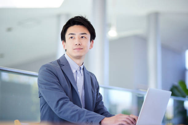 istock Young Japanese business man 1464463997