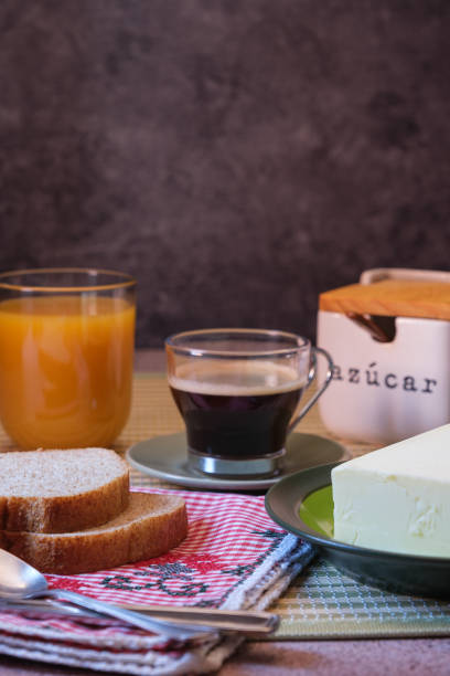 istock Bread slices with butter, coffee and orange juice 1464475196