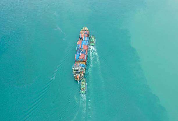 istock Aerial top view of cargo ship carrying container for import export goods  to customer,concept logistic and supply chain 1464476467