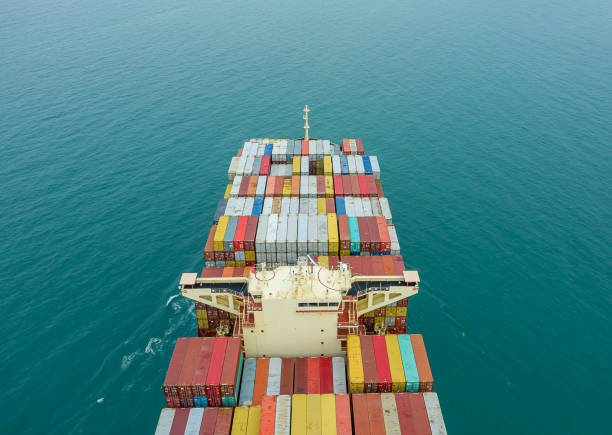 istock Aerial top view of cargo ship carrying container for import export goods  to customer,concept logistic and supply chain 1464476543