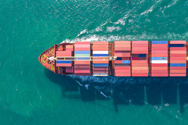 istock Aerial top view of cargo ship carrying container for import export goods  to customer,concept logistic and supply chain 1464478143