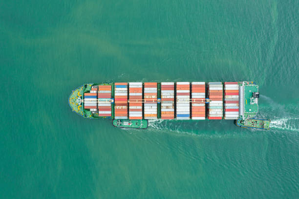istock Aerial top view of cargo ship carrying container for import export goods  to customer,concept logistic and supply chain 1464478978