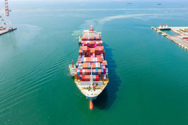 istock Aerial top view of cargo ship carrying container for import export goods  to customer,concept logistic and supply chain 1464479025