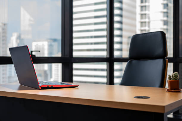 istock chair and notebook on desk in modern office ,nobody 1464479160