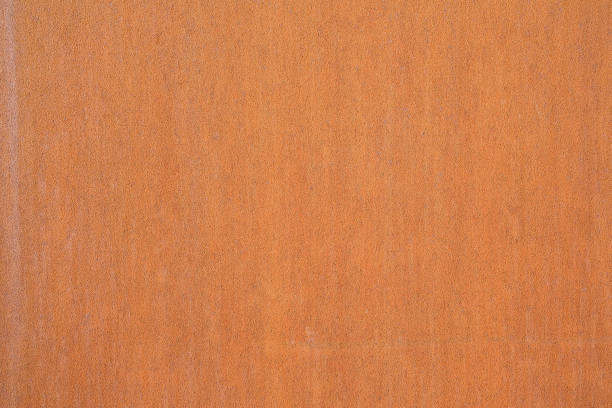 istock Rusty metal plate front view used in construction industry - Corten steel background 1464479535