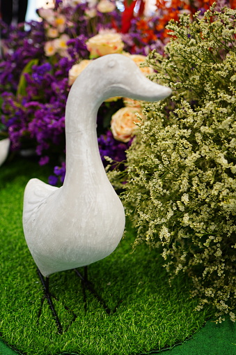 Lovely White Duck Statue Decorated in indoor garden