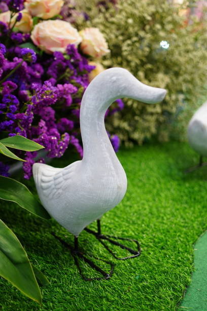 istock Lovely White Duck Statue Decorated 1464482340