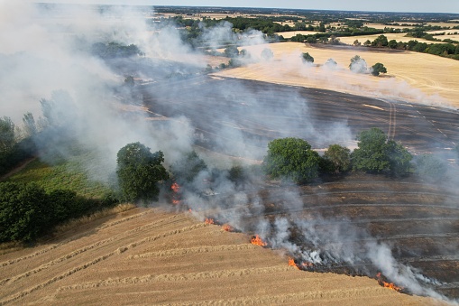 Huge Wildfires in farm fields Essex Ongar drone aerial view