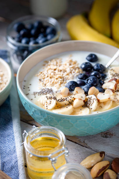 istock Blueberries, banana slices, oat flakes and yoghurt 1464491117