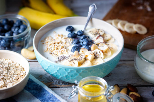 istock Blueberries, banana slices, oat flakes and yoghurt 1464491126