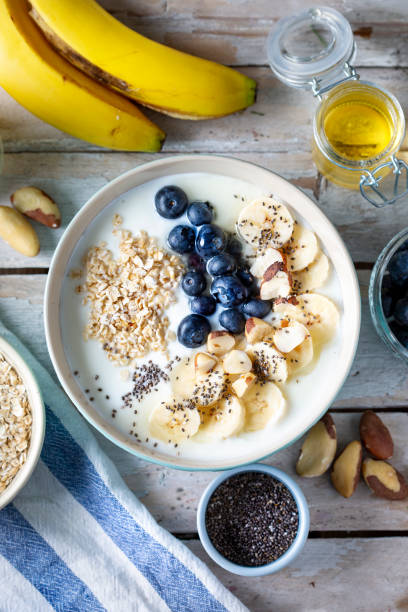istock Blueberries, banana slices, oat flakes and yoghurt 1464491189