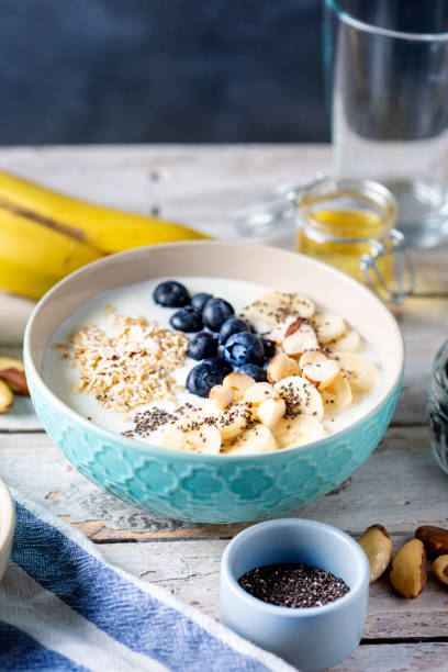 istock Blueberries, banana slices, oat flakes and yoghurt 1464491213