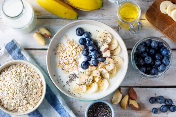 istock Blueberries, banana slices, oat flakes and yoghurt 1464491264