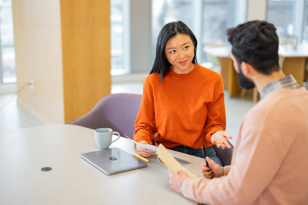 istock Financial consultation / financial advisor with client 1464494817
