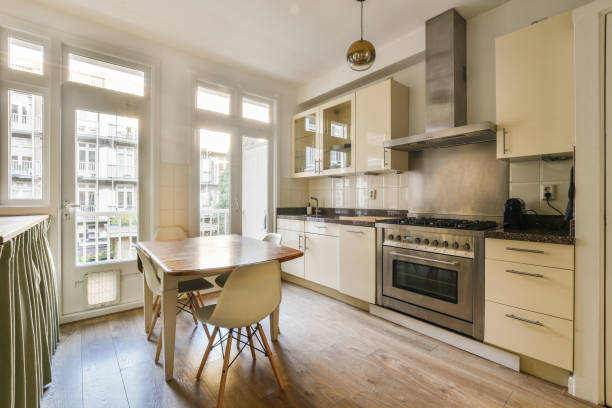 istock a kitchen with white cabinets and a wooden table 1464496825