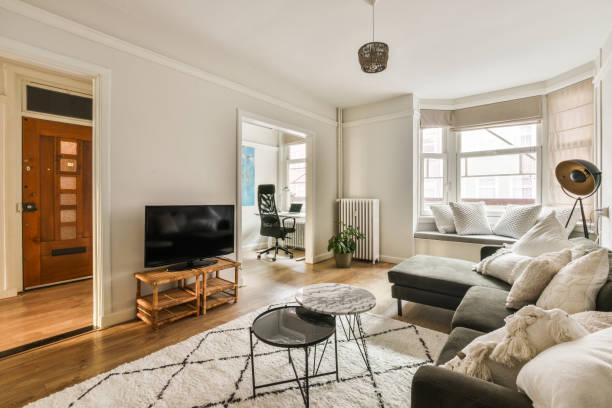 istock a living room with a couch and a tv 1464496919
