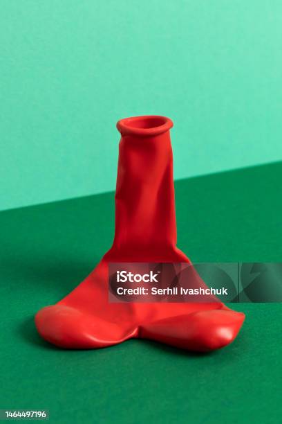 Deflated Red Balloon Stock Photo - Download Image Now - Erectile Dysfunction, Penis, Concepts