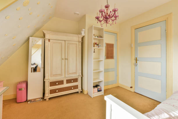 istock a bedroom with a closet and a pink suitcase 1464497799