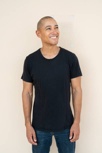 istock Portrait of handsome bald man smiling and thinking 1464499463