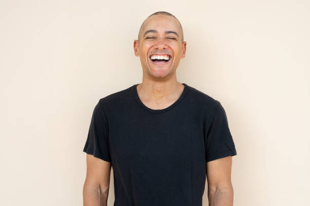 istock Portrait of handsome bald man laughing 1464500848