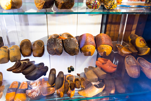 Amsterdam, Netherlands - September 26, 2017: Traditional handmade Dutch wooden clogs in Clog Museum and Wooden Shoe Workshop at Zaanse Schans. Amsterdam, Netherlands.