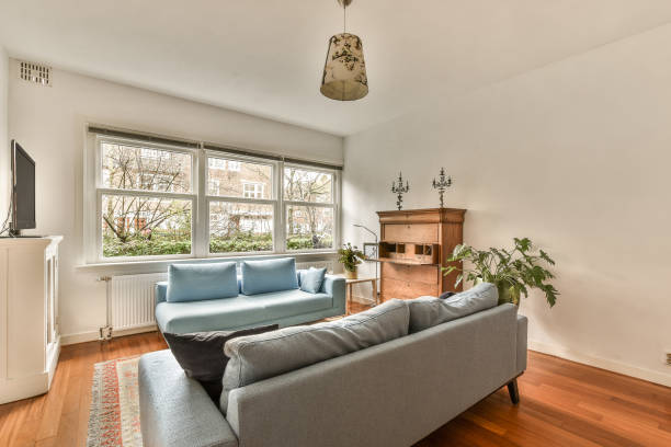 istock a living room with two couches and a tv 1464503823