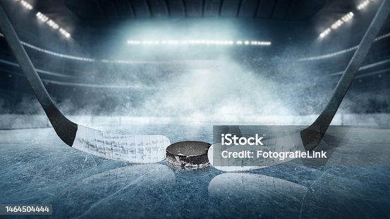 istock Ice hockey players on the grand ice arena - stadium 1464504444