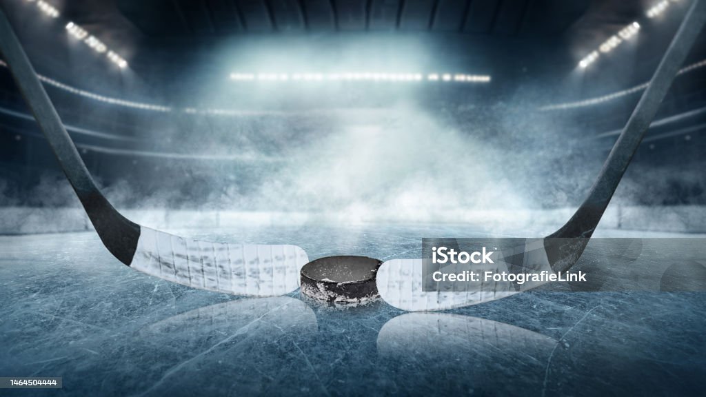 Ice hockey players on the grand ice arena - stadium Hockey Stock Photo