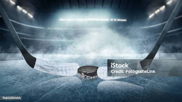 Ice Hockey Players On The Grand Ice Arena Stadium Stock Photo - Download Image Now
