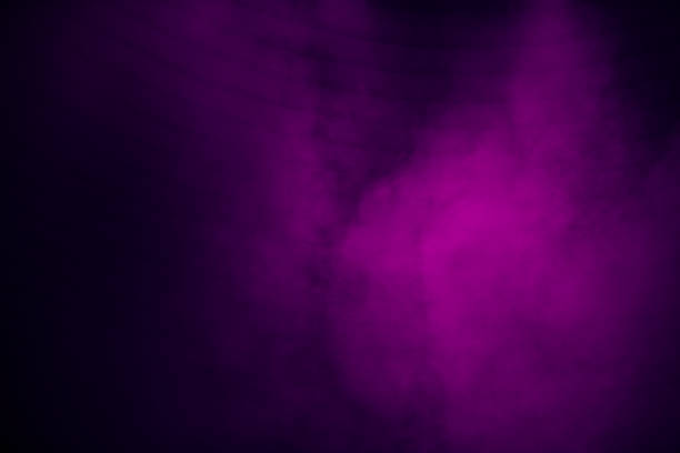 Purple stage or circus smoke on a dark background.