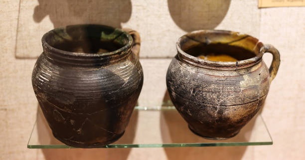 istock Ancient Ukrainian ceramic clay jugs on a glass stand 1464506933