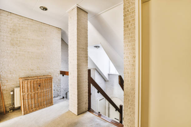 istock a hallway with brick walls and stairs and a basket 1464506984