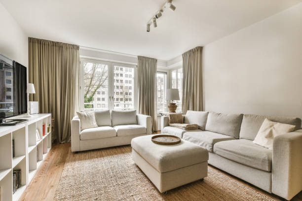 istock a living room with two couches and a tv 1464507257